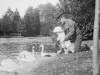 [Charles Croft] and infant with swans
